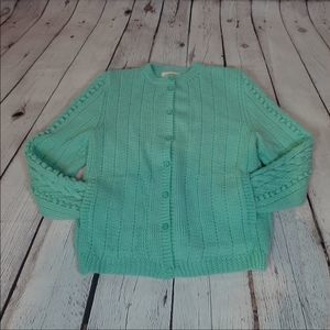 Hand made cardigan sweater with slip pockets